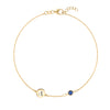 14k yellow gold Classic bracelet featuring one sapphire and one 1/4” flat disc engraved with the letter A - front view