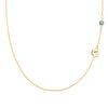 14k gold Classic necklace featuring one Nantucket blue topaz and one 1/4” flat disc engraved with the letter A - front view
