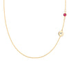 14k gold cable chain Classic necklace featuring one ruby and one 1/4” flat disc engraved with the letter A - front view