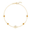 14k yellow gold Classic bracelet featuring four citrines and one 1/4” flat disc engraved with the letter A - front view