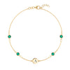 14k yellow gold Classic bracelet featuring four emeralds and one 1/4” flat disc engraved with the letter A - front view