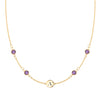 14k gold cable chain Classic necklace featuring four amethysts and one 1/4” flat disc engraved with the letter A - front view