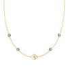 14k gold cable chain Classic necklace featuring four Nantucket blue topaz and one 1/4” flat disc engraved with the letter A