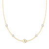 14k gold Classic necklace featuring four moonstones and one 1/4” flat disc engraved with the letter A - front view