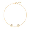 14k yellow gold cable chain bracelet featuring two 1/4” flat engraved letter discs, spelling XO - front view