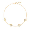 14k yellow gold cable chain bracelet featuring four 1/4” flat discs engraved with letters ABCD - front view