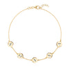 14k yellow gold cable chain bracelet featuring five 1/4” flat engraved letter discs, spelling NONNA - front view