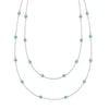 Bayberry Birthstone Wrap necklace featuring 4 mm briolette cut Nantucket blue topaz bezel set in 14k white gold