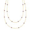 Bayberry Birthstone Wrap necklace featuring 4 mm briolette cut amethysts bezel set in 14k yellow gold - front view