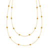Bayberry Birthstone Wrap necklace featuring 4 mm briolette cut citrines bezel set in 14k yellow gold - front view