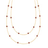 Bayberry Birthstone Wrap necklace featuring 4 mm briolette cut garnets bezel set in 14k yellow gold - front view