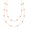Bayberry Birthstone Wrap necklace featuring 4 mm briolette cut rubies set in 14k yellow gold - front view