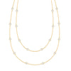 Bayberry Birthstone Wrap necklace featuring 4 mm briolette cut white topaz bezel set in 14k yellow gold - front view