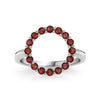 Rosecliff open circle ring featuring sixteen 2 mm faceted round cut garnets prong set in 14k white gold