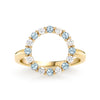 Rosecliff open circle ring featuring 16 alternating 2 mm Nantucket blue topaz and diamonds prong set in 14k gold - front view