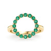 Rosecliff open circle ring featuring sixteen 2 mm faceted round cut emeralds prong set in 14k yellow gold - front view