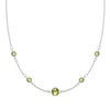 Grand & Classic necklace featuring one 6 mm and four 4 mm Peridots bezel set in 14k white gold