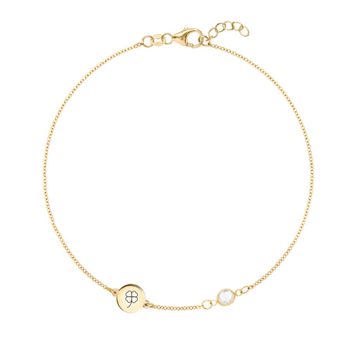 14k yellow gold Classic bracelet featuring one birthstone and one 1/4” flat disc, engraved with a four leaf clover