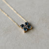Greenwich cable chain necklace featuring four 4 mm round cut alexandrites and one 2.1 mm diamond bezel set in 14k gold