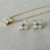 Necklace and a pair of 14k gold Greenwich 4 Birthstone earrings each featuring four 4 mm gemstones and one 2.1 mm diamond