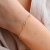 Infinity & Petite 4 Birthstone Bracelet in 14k Gold