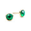 Pair of 14k yellow gold Grand stud earrings each featuring one 6 mm briolette cut bezel set emerald - front view