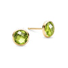 Pair of 14k yellow gold Grand stud earrings each featuring one 6 mm briolette cut bezel set peridot - front view