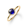 1.6 mm wide 14k yellow gold Grand ring featuring one 6 mm briolette cut bezel set sapphire - angled view