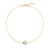 Grand 1.17 mm cable chain bracelet in 14k yellow gold featuring one 6 mm briolette cut bezel set aquamarine - front view