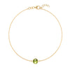 Grand 1.17 mm cable chain bracelet in 14k yellow gold featuring one 6 mm briolette cut bezel set peridot - front view