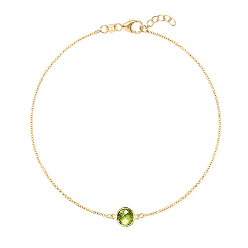 Grand 1.17 mm cable chain bracelet in 14k yellow gold featuring one 6 mm briolette cut bezel set peridot - front view