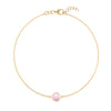 Grand 1.17 mm cable chain bracelet in 14k yellow gold featuring one 6 mm briolette cut bezel set pink opal - front view