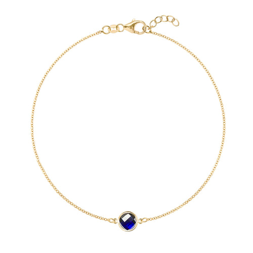 Grand 1.17 mm cable chain bracelet in 14k yellow gold featuring one 6 mm briolette cut bezel set sapphire - front view