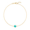 Grand 1.17 mm cable chain bracelet in 14k yellow gold featuring one 6 mm briolette cut bezel set turquoise - front view