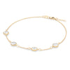 Grand 1.17 mm cable chain bracelet in 14k yellow gold featuring four 6 mm briolette cut bezel set gemstones - angled view