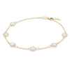 Grand 1.17 mm cable chain bracelet in 14k yellow gold featuring six 6 mm briolette cut bezel set gemstones - angled view