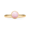 1.6 mm wide 14k yellow gold Grand ring featuring one 6 mm briolette cut bezel set pink opal - front view