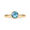 1.6 mm wide 14k yellow gold Grand ring featuring one 6 mm briolette cut bezel set Nantucket blue topaz - front view