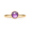 1.6 mm wide 14k yellow gold Grand ring featuring one 6 mm briolette cut bezel set amethyst - front view
