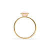 1.6 mm wide 14k yellow gold Grand ring featuring one 6 mm briolette cut bezel set pink opal - standing view