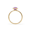 1.6 mm wide 14k yellow gold Grand ring featuring one 6 mm briolette cut bezel set amethyst - standing view