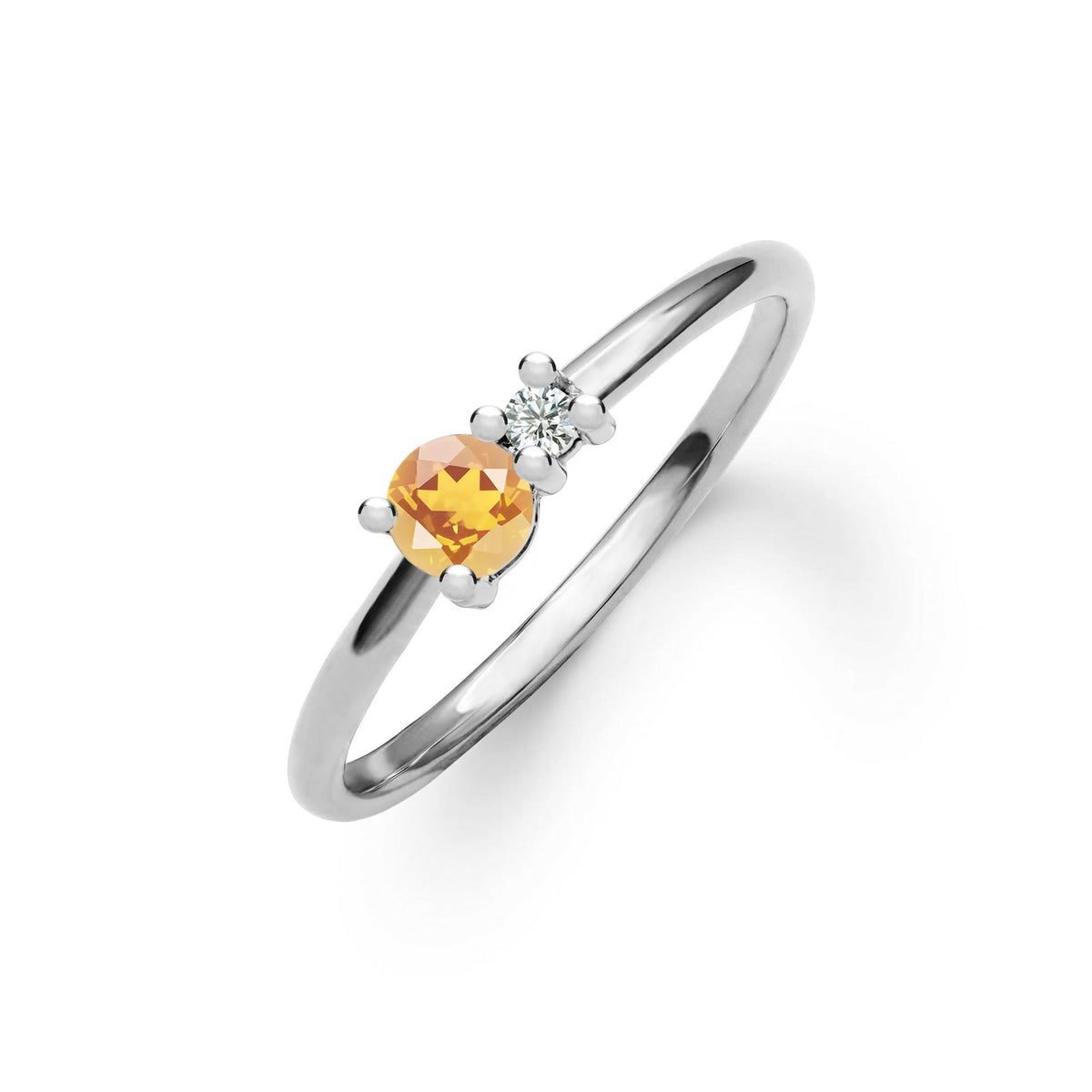 Greenwich ring featuring one 4 mm faceted round cut citrine and one 2.1 mm diamond prong set in 14k white gold
