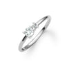 Greenwich ring featuring one 4 mm faceted round cut white topaz and one 2.1 mm diamond prong set in 14k white gold
