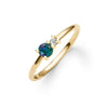 Greenwich ring featuring one 4 mm faceted round cut alexandrite and one 2.1 mm diamond prong set in 14k gold - angled view