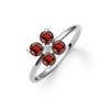 Greenwich ring featuring four 4 mm faceted round cut garnets and one 2.1 mm diamond prong set in 14k white gold
