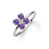 Greenwich ring featuring four 4 mm faceted round cut amethysts and one 2.1 mm diamond prong set in 14k white gold