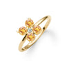 Greenwich ring featuring four 4 mm faceted round cut citrines and one 2.1 mm diamond prong set in 14k gold - angled view