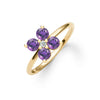 Greenwich ring featuring four 4 mm faceted round cut amethysts and one 2.1 mm diamond prong set in 14k gold - angled view