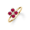 Greenwich ring featuring four 4 mm faceted round cut rubies and one 2.1 mm diamond prong set in 14k gold - angled view