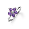 Greenwich ring featuring five 4 mm faceted round cut amethysts and one 2.1 mm diamond prong set in 14k white gold